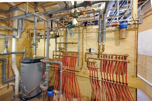 HYBRID SOLAR/GEOTHERMAL HEATING AND COOLING